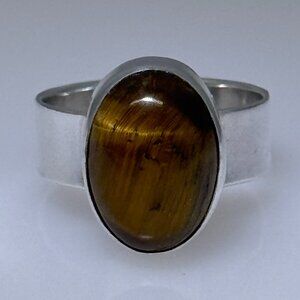 Sterling silver ring set with natural oval Tiger Eye cabochon, size 7, NWOT